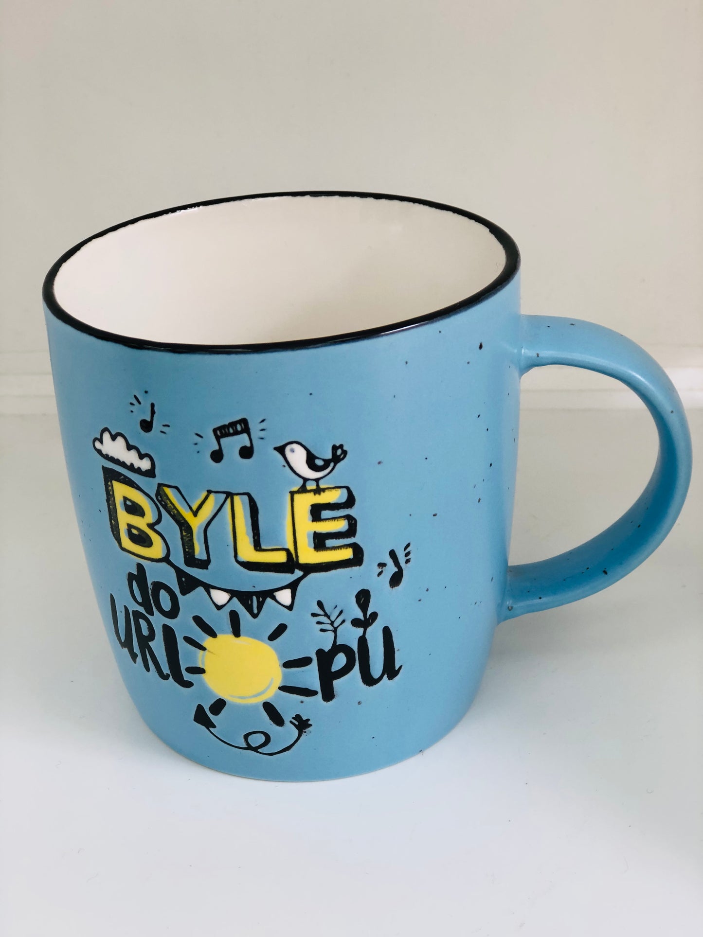 Ceramic mug with writing