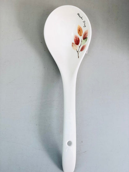 Large ceramic spoon with leaves