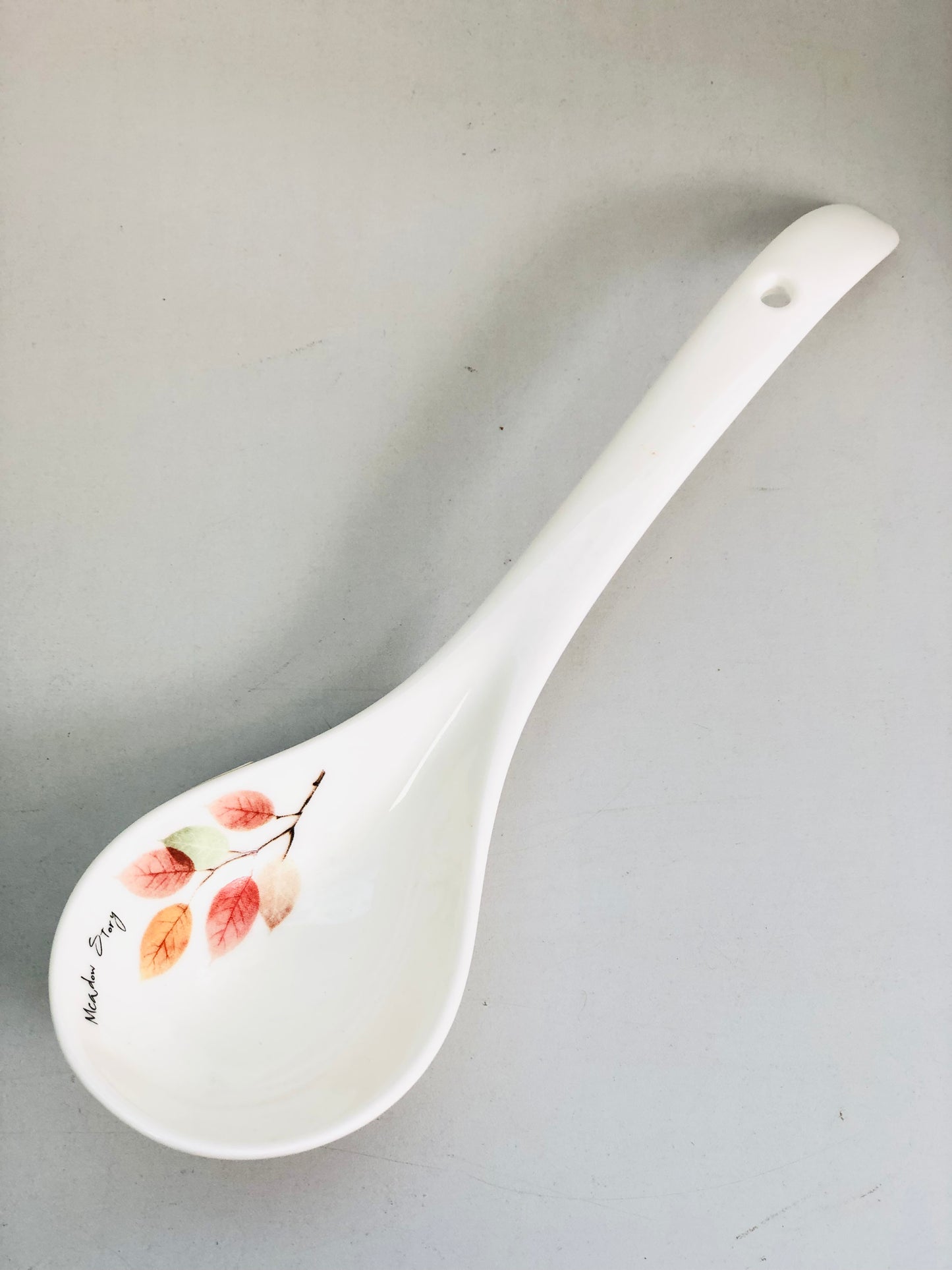 Large ceramic spoon with leaves