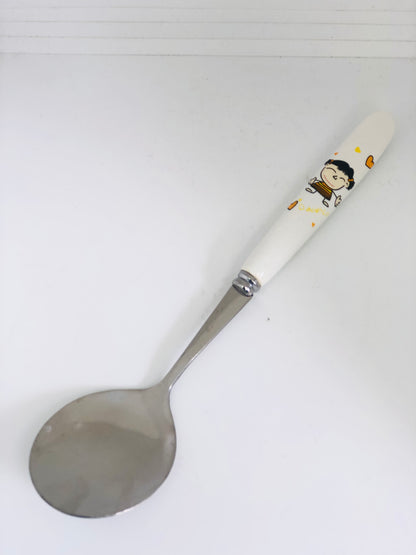 Ceramic spoon with a drawing of a girl