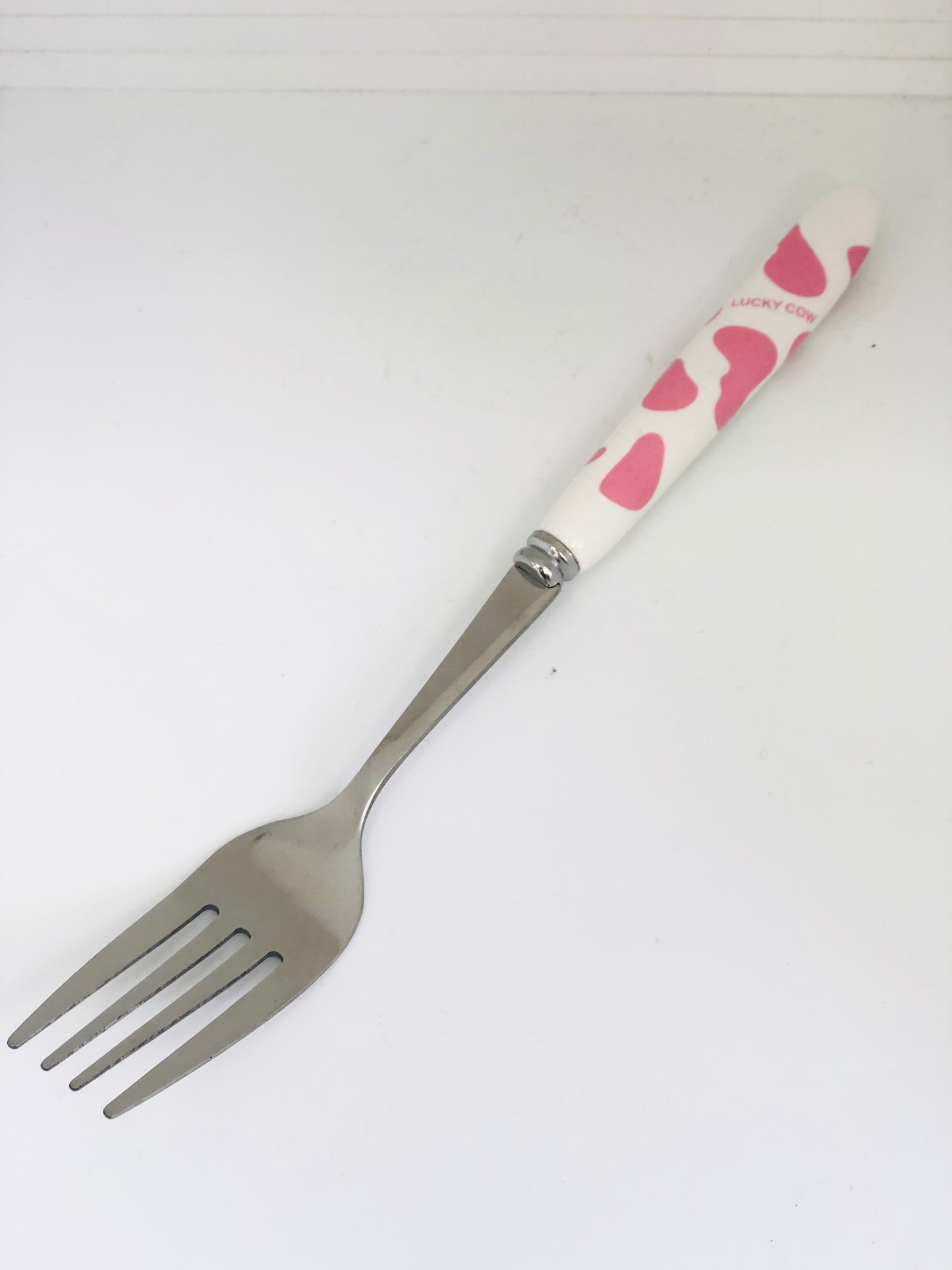 White and pink ceramic spoon and fork set