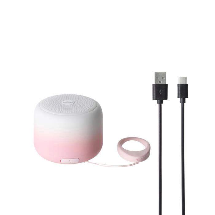 Pink and white wireless speaker