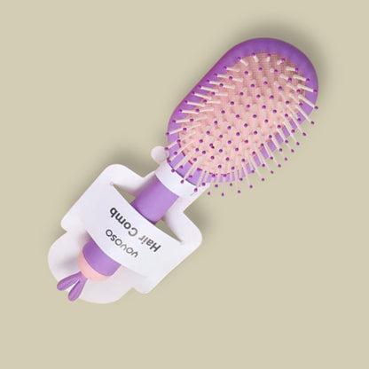 فرشاة شعر صغيرة ملونة