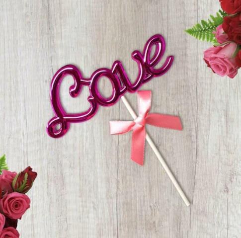 Plastic cake love word